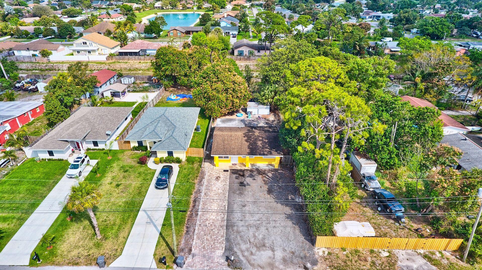 5783 Lime Road West Palm Beach, FL 33413 - Photo 5 of 61 05_dji_0026_27_28_29_30