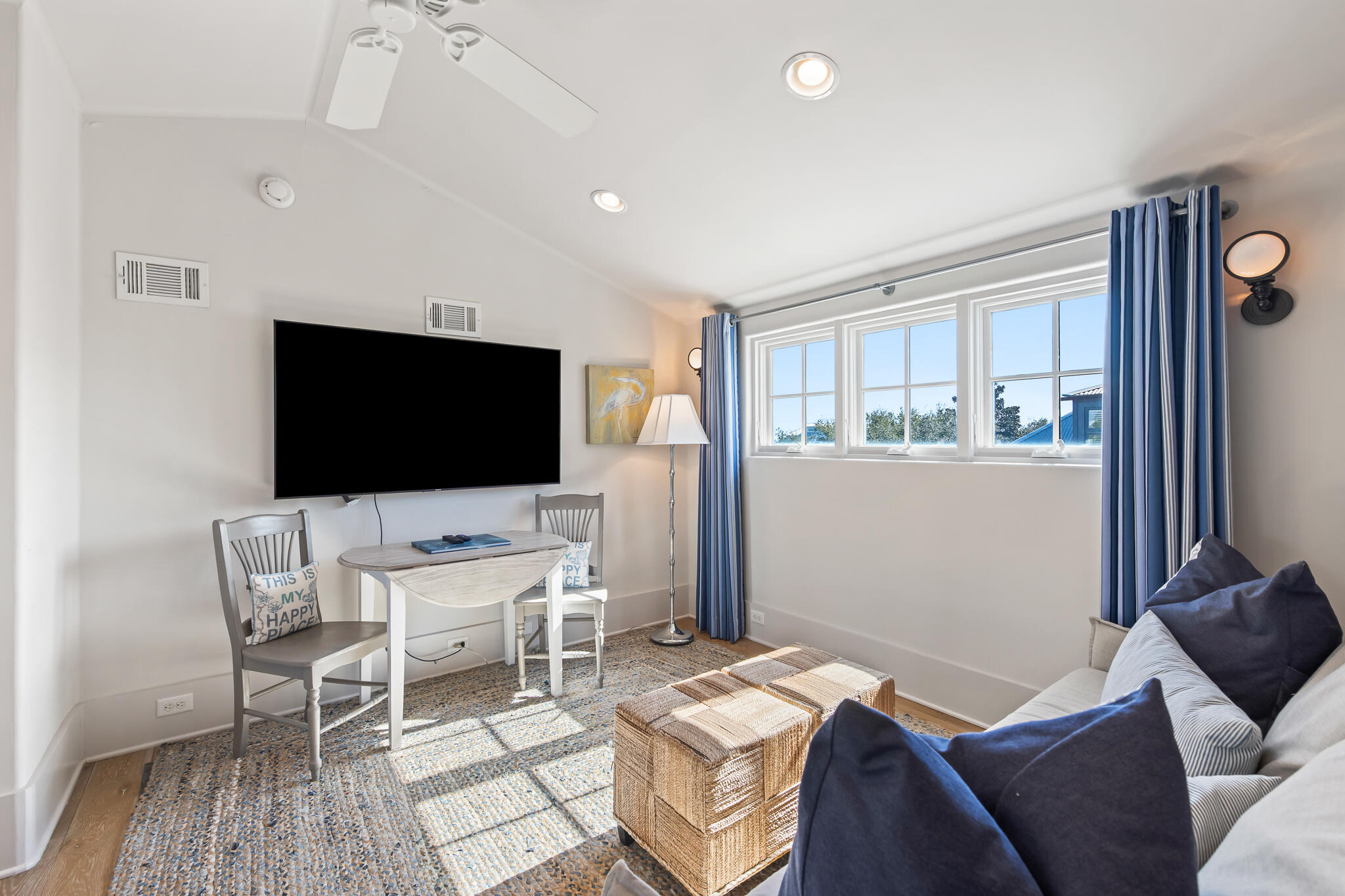 188 Round Road Inlet Beach, FL 32461 - Photo 59 of 98 a living room with a flat screen tv and a couch