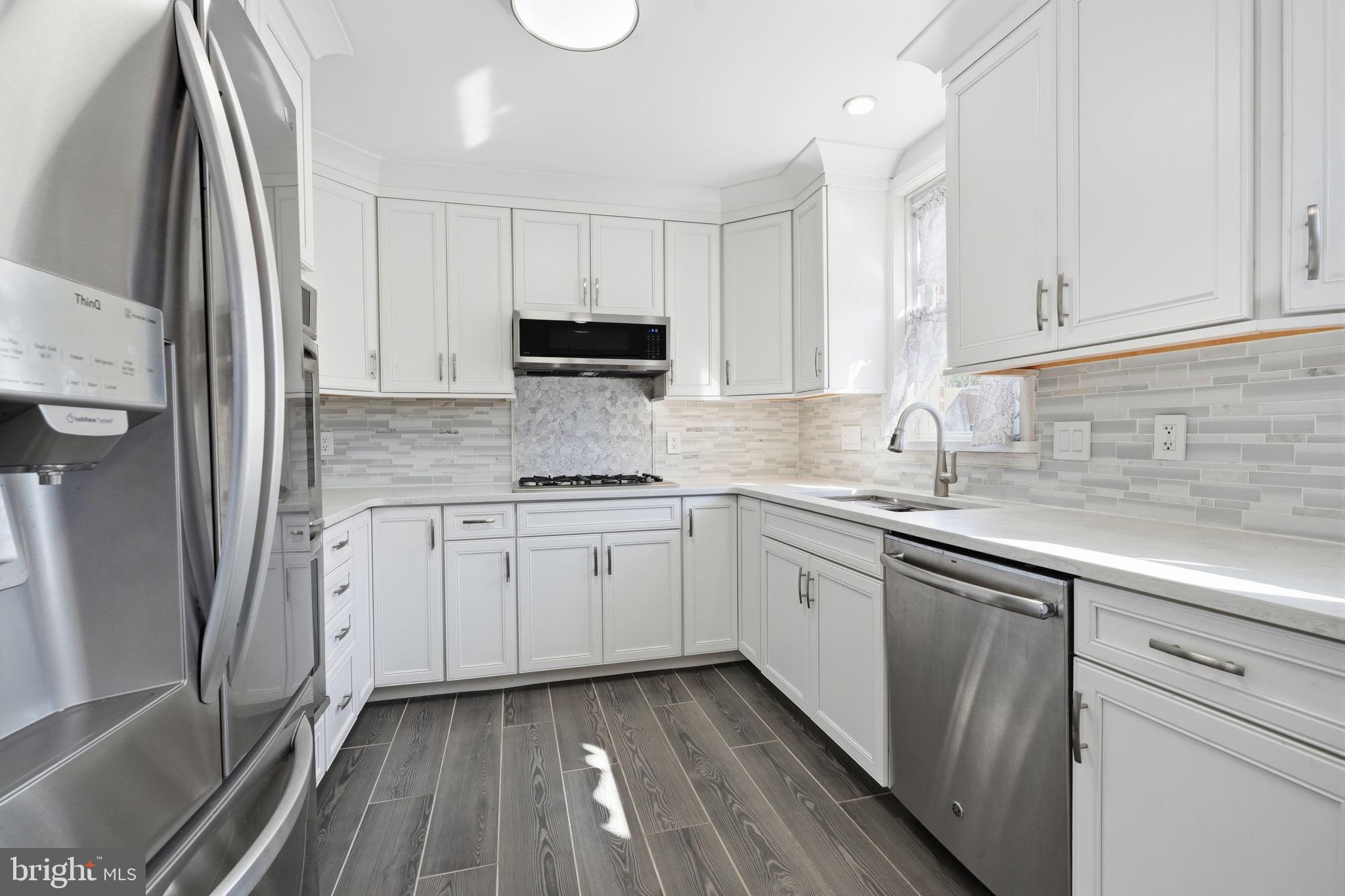 1025 Friendship Street Philadelphia, PA 19111 - Photo 9 of 36 Modern kitchen with sleek finishes.