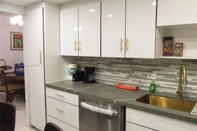 a view of hallway with wooden floor