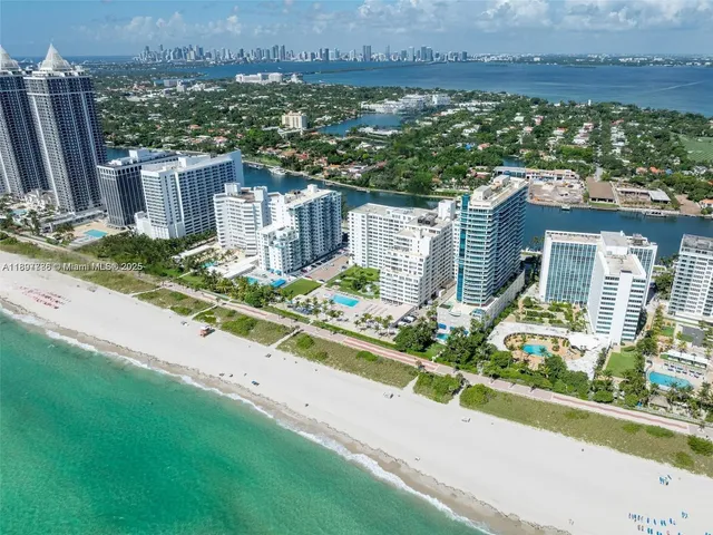 a view of swimming pool with a table and chairs