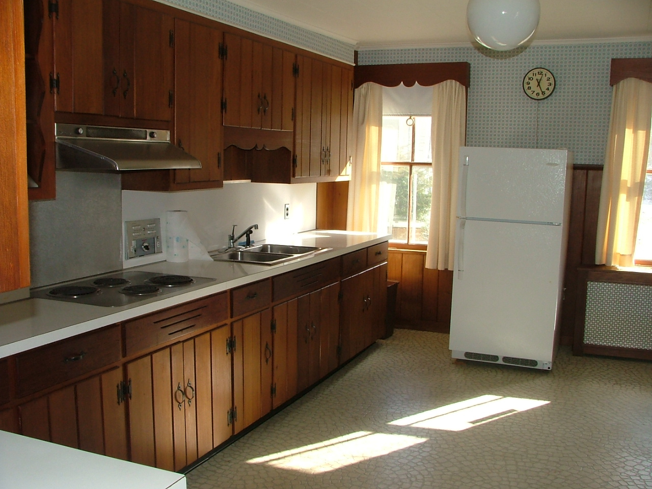8 Meadow Street Great Barrington, MA 01236 - Photo 2 of 7 a kitchen with stainless steel appliances granite countertop wooden cabinets a sink and a window
