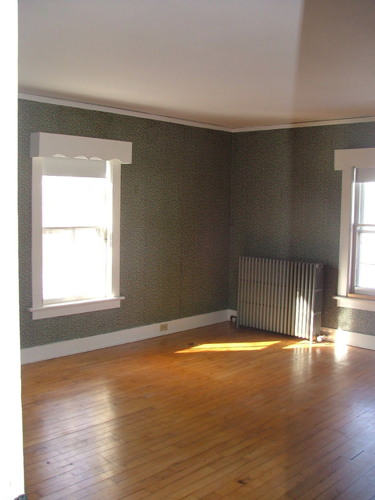 8 Meadow Street Great Barrington, MA 01236 - Photo 5 of 7 an empty room with wooden floor and windows