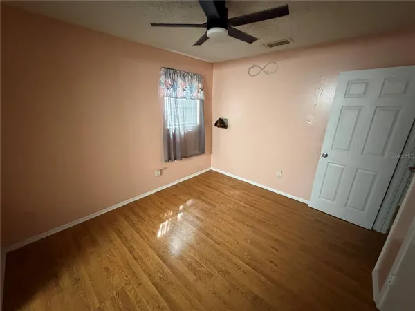 an empty room with a workspace