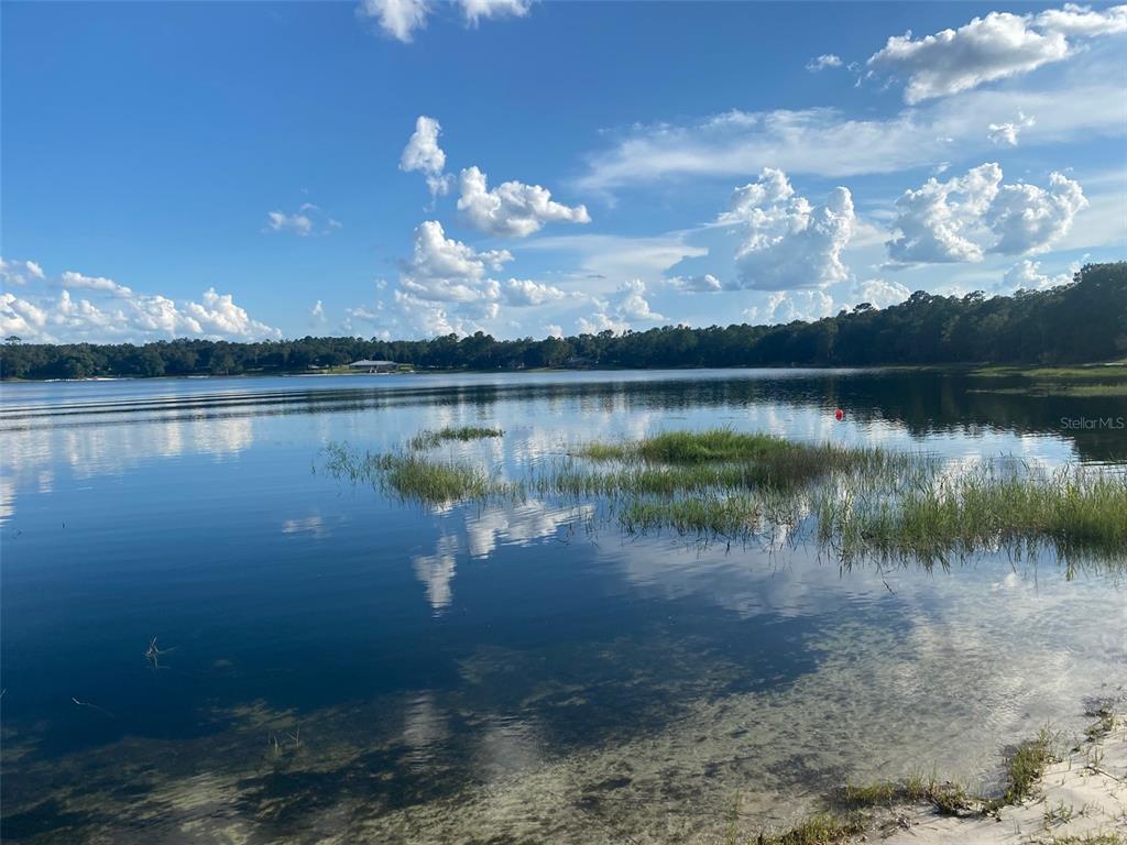 107 Eliam Road Melrose, FL 32666 - Photo 39 of 62 a view of a lake in between two chairs