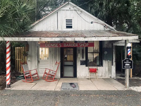 a street sign on a pole on a street