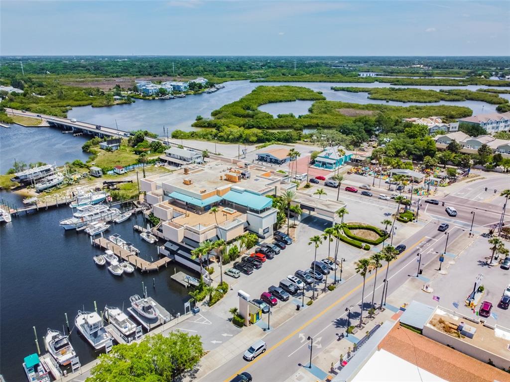 0 Athens Street Tarpon Springs, FL 34689 - Photo 5 of 6 an aerial view of ocean and residential houses with outdoor space