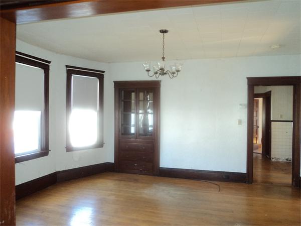 59 King Philip Road Worcester, MA 01606 - Photo 14 of 20 a view of an empty room with wooden floor and a window