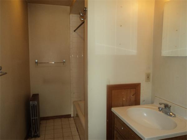 59 King Philip Road Worcester, MA 01606 - Photo 15 of 20 a bathroom with a sink and a mirror