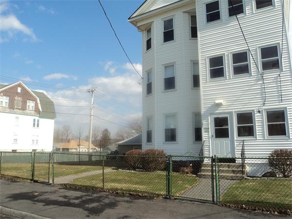 59 King Philip Road Worcester, MA 01606 - Photo 20 of 20 a front view of a house with garden