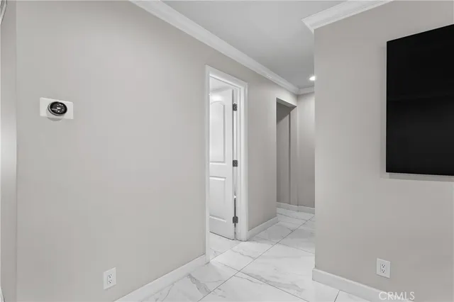 a bathroom with a sink mirror and a shower