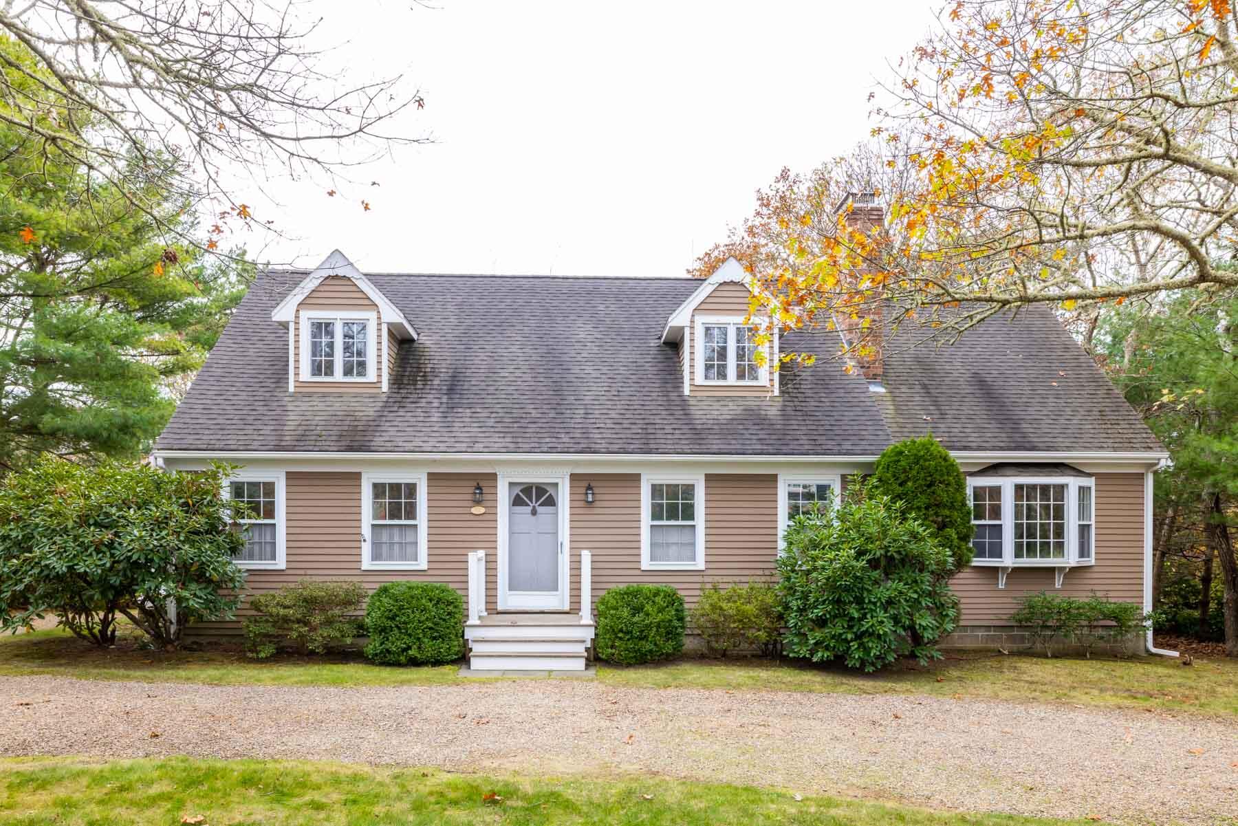 68 Marthas Road Edgartown, MA 02539 - Photo 1 of 20 a front view of a house with garden