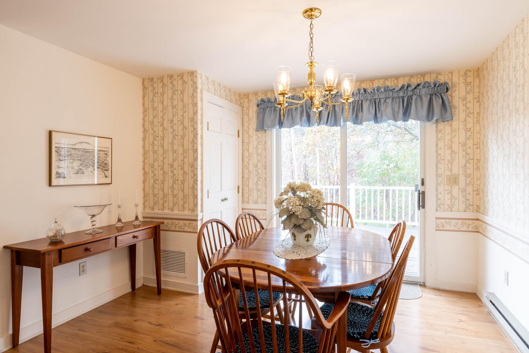 68 Marthas Road Edgartown, MA 02539 - Photo 4 of 20 a view of a dining room with furniture window and outside view