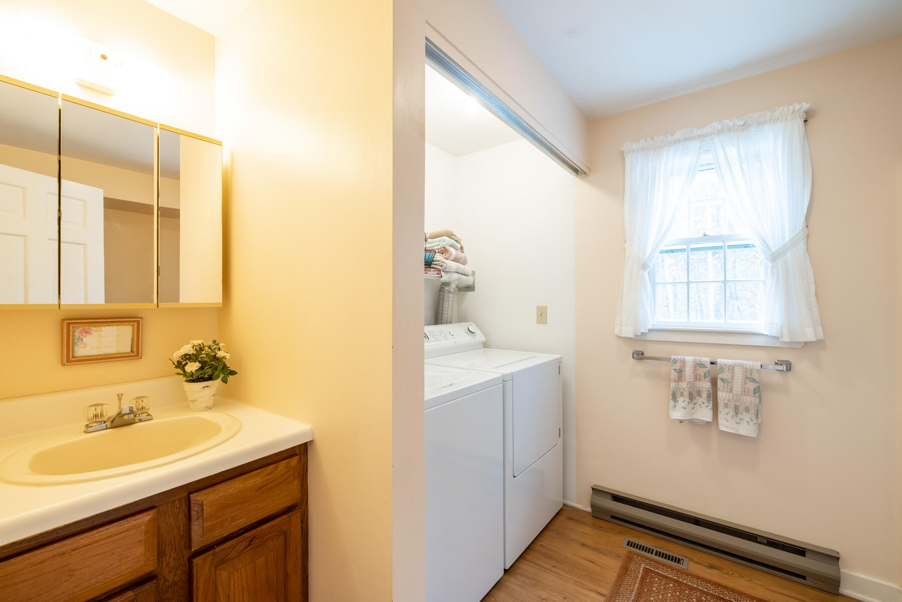 68 Marthas Road Edgartown, MA 02539 - Photo 8 of 20 a bathroom with a sink and a mirror