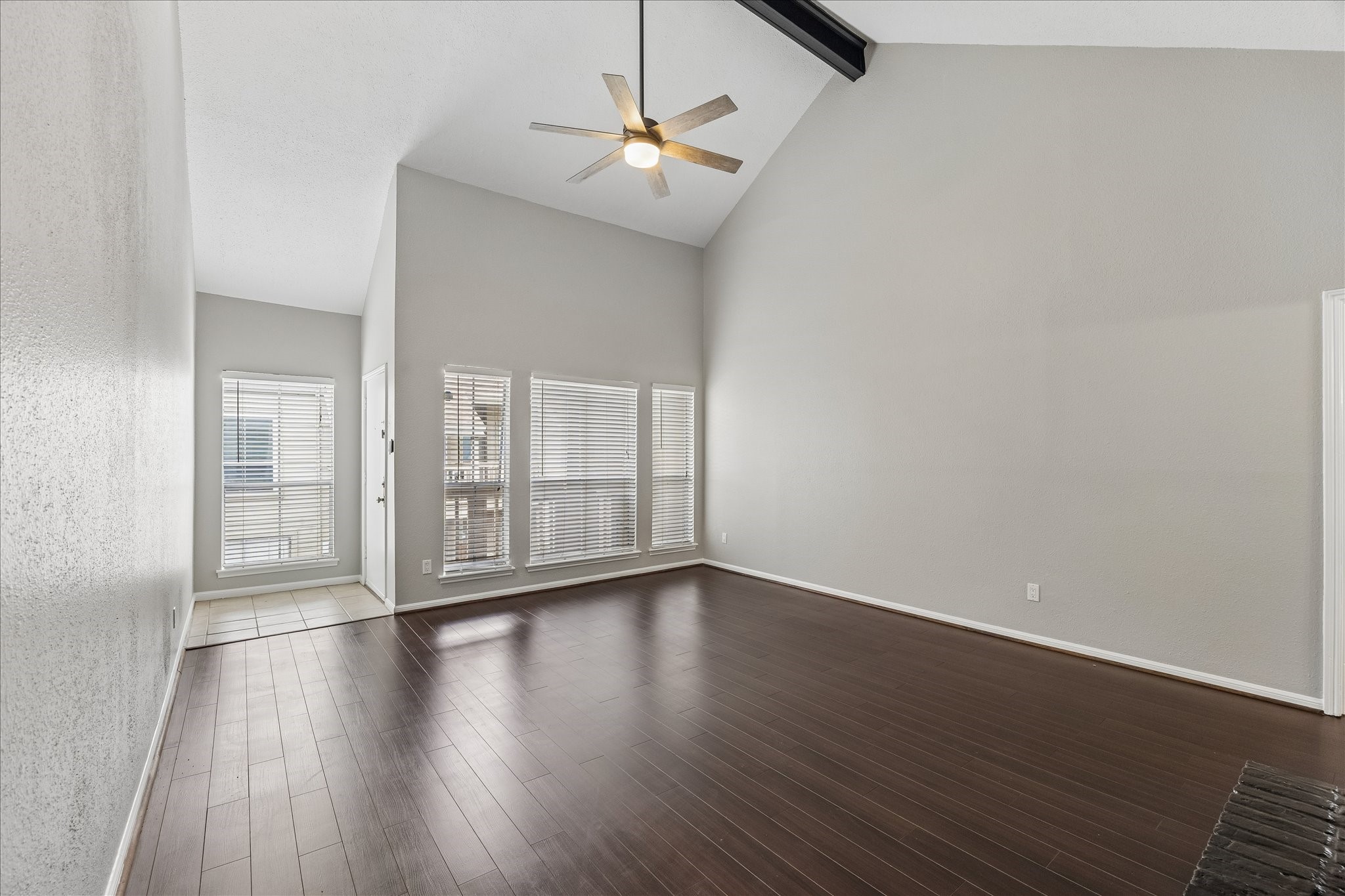 2100 Tanglewilde Street, Unit 124 Houston, TX 77063 - Photo 20 of 20 wooden floor in an empty room with a window