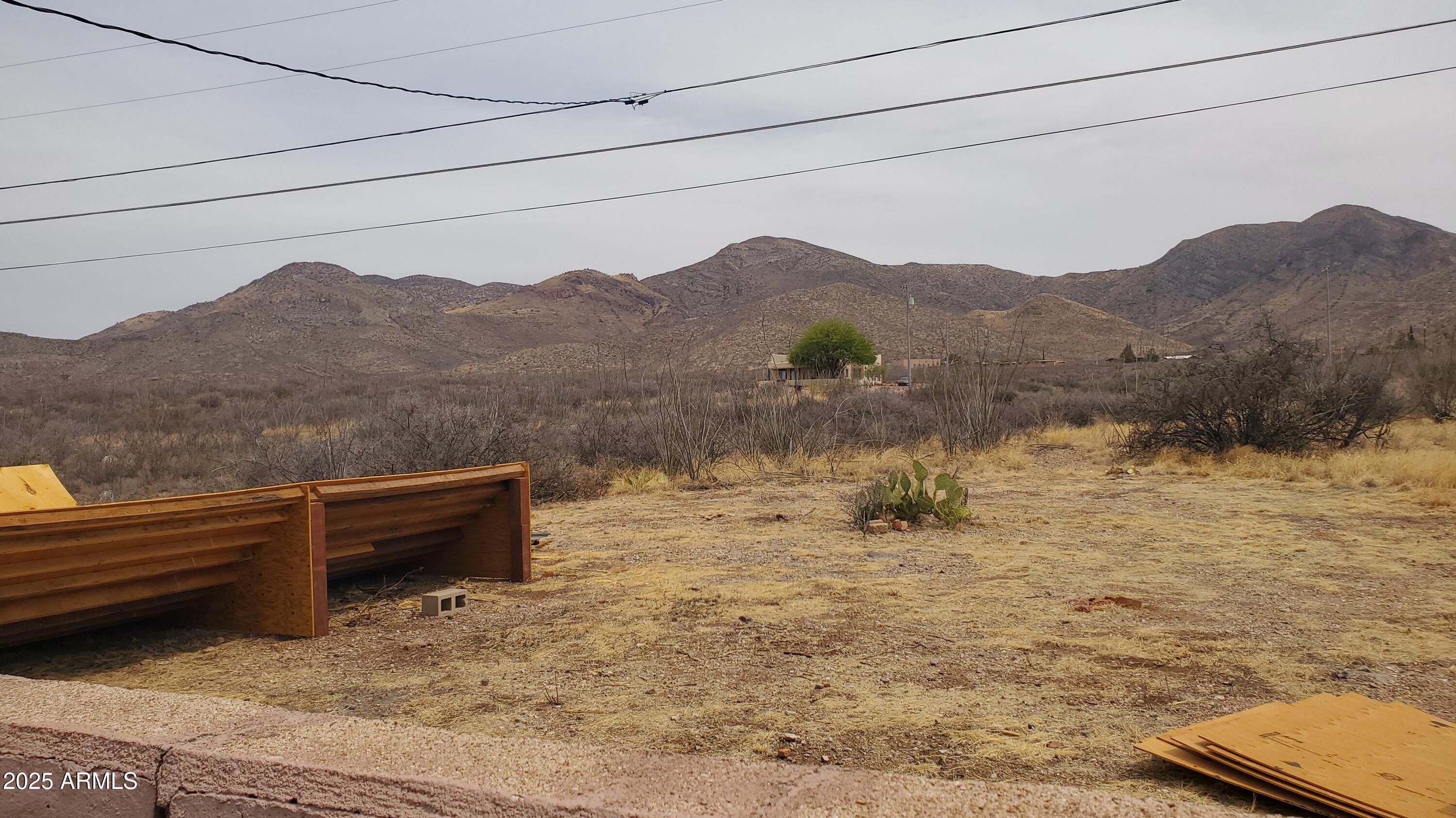 89 Pima Drive Bisbee, AZ 85603 - Photo 34 of 42 a view of a lake with a mountain