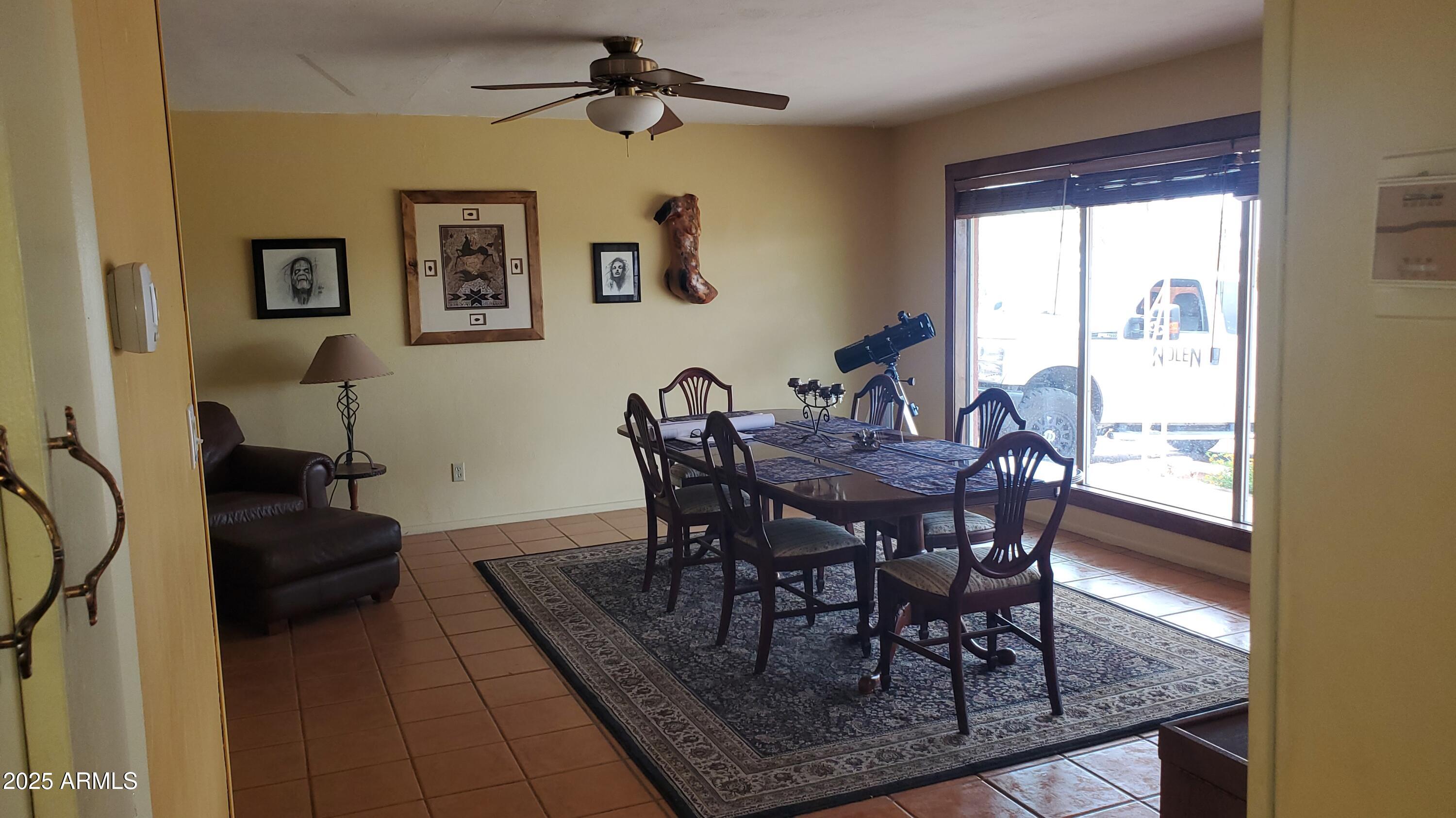 89 Pima Drive Bisbee, AZ 85603 - Photo 6 of 42 a dining room with furniture and window