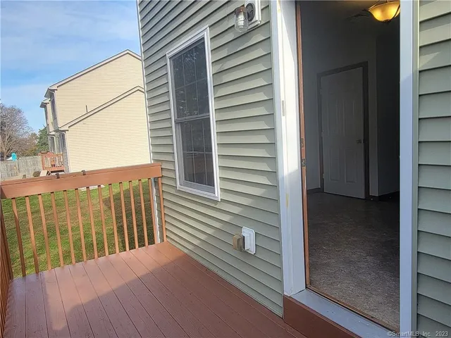 a view of a balcony with door