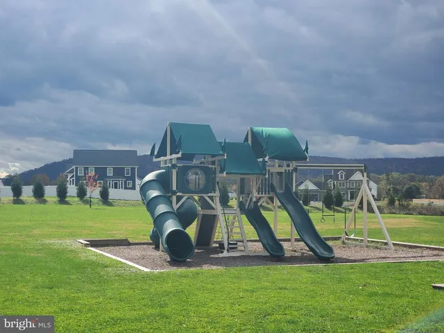 a green field with view of in background