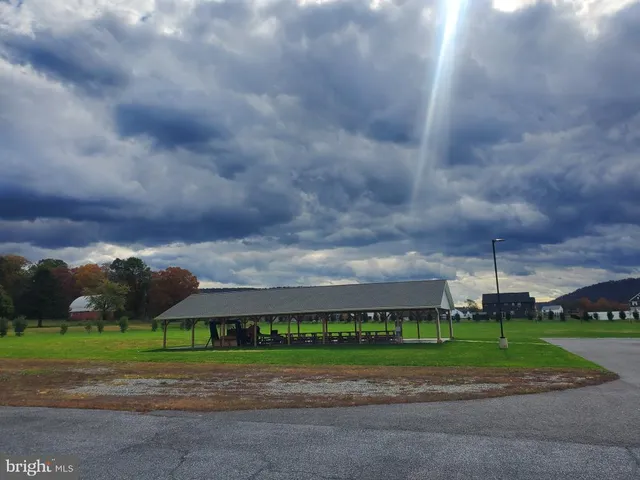 a view of a street with sign board