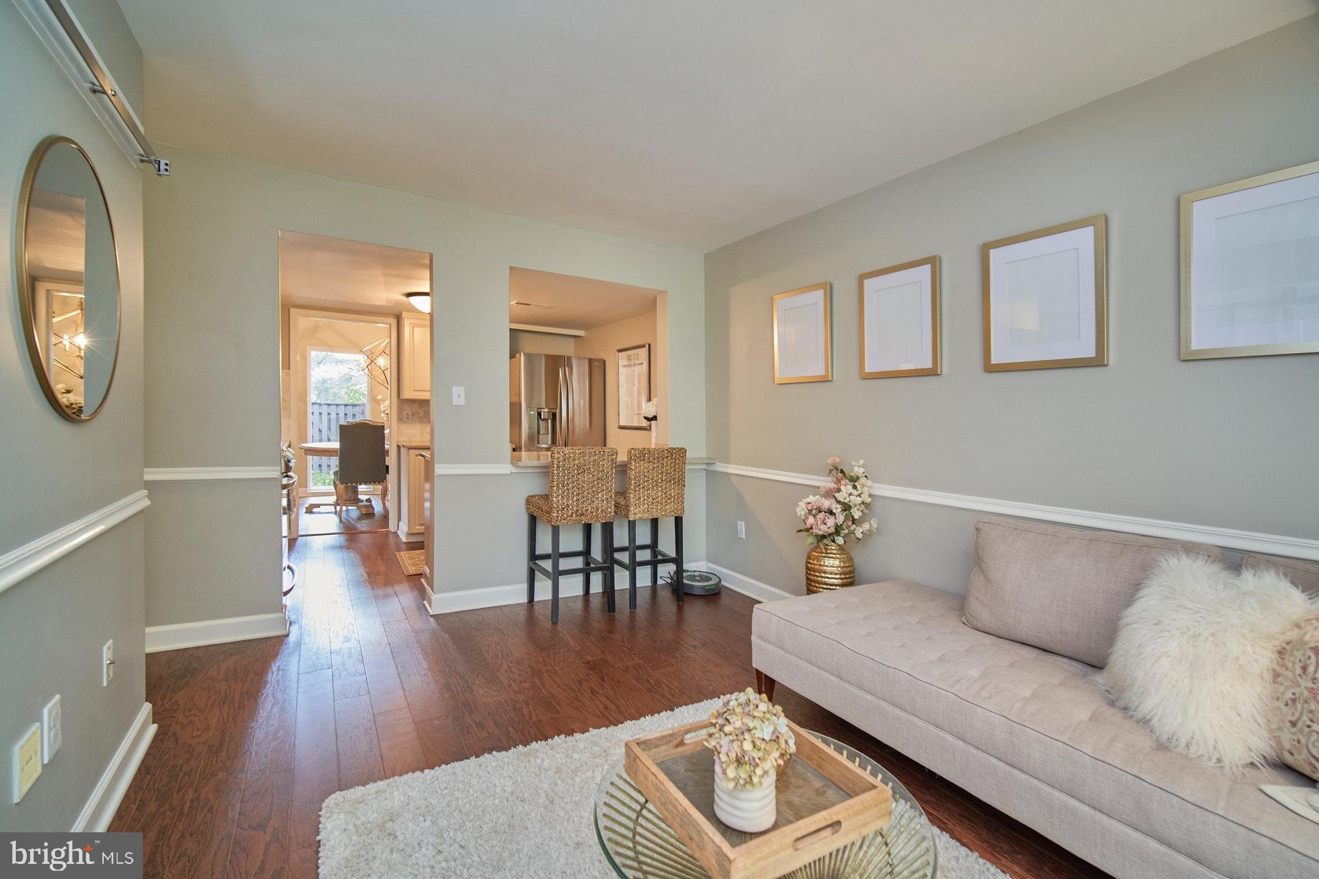 1813 Ivy Oak Square Reston, VA 20190 - Photo 13 of 28 Sitting Area showing view to kitchen