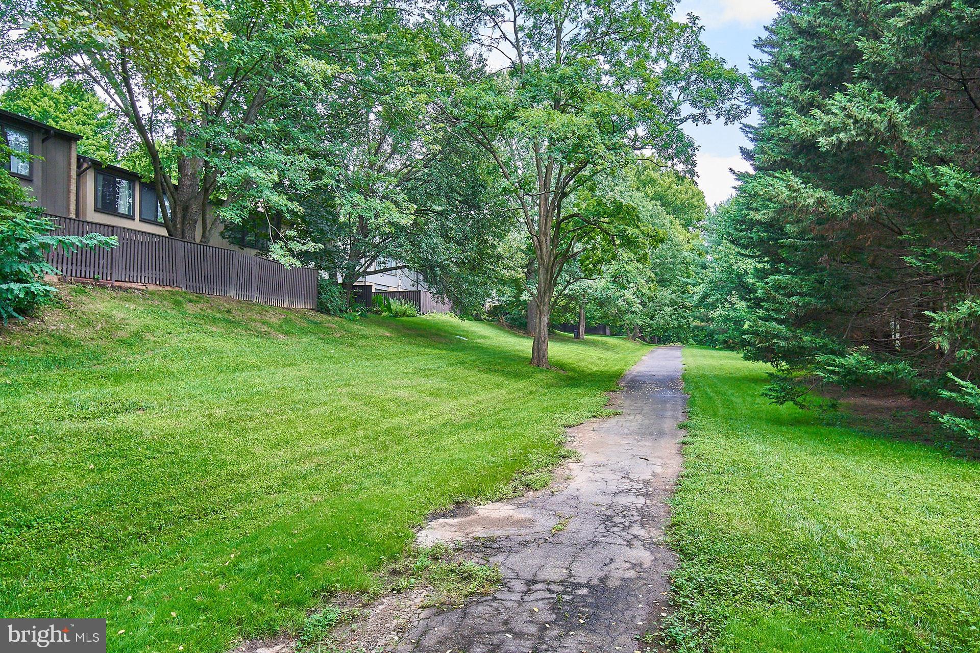 1813 Ivy Oak Square Reston, VA 20190 - Photo 25 of 28 View of path behind townhome fencing