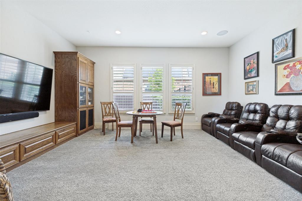 971 Elk Ridge Road Prosper, TX 75078 - Photo 20 of 29 Who wants to watch a movie? Ready for game night? There is room for everyone!