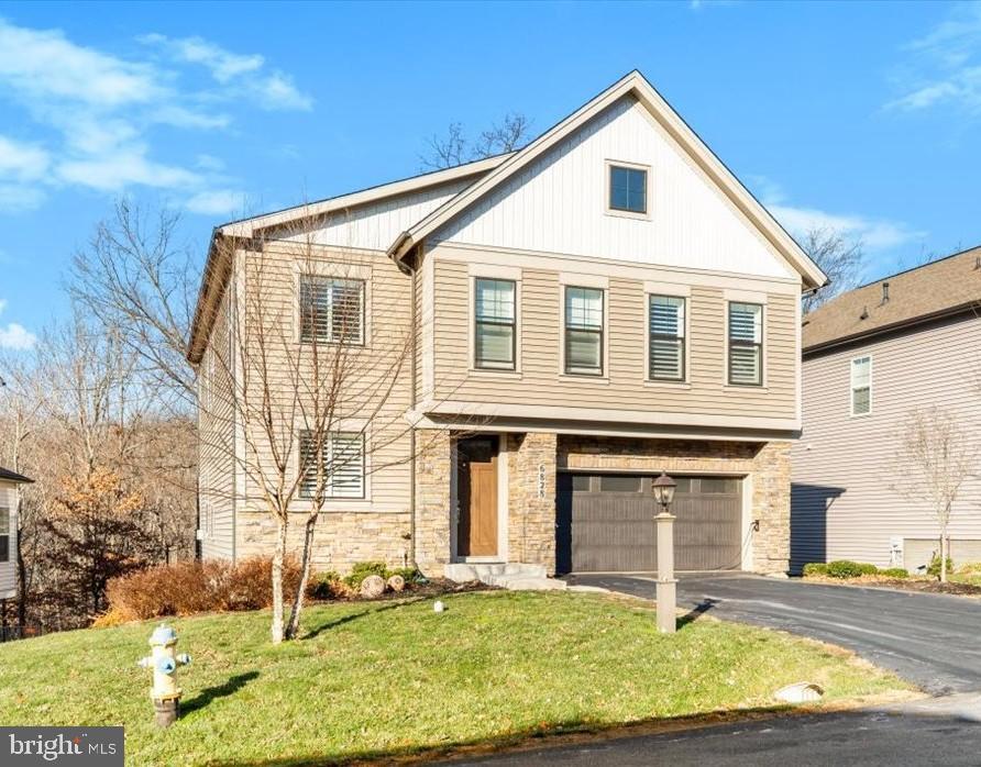 Modern home with charming curb appeal.