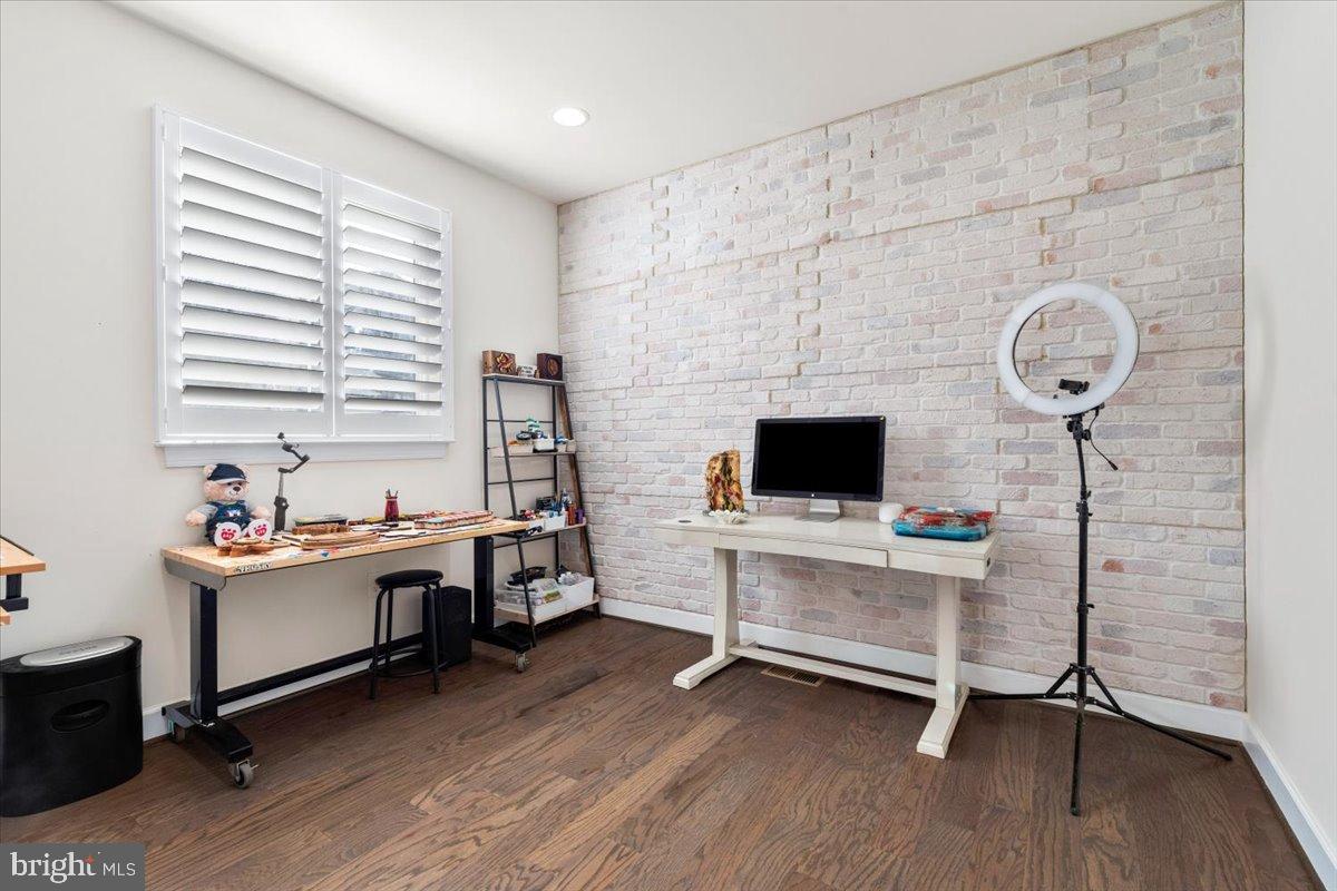 6828 West Shavano Road New Market, MD 21774 - Photo 12 of 58 a view of a workspace with furniture and a window