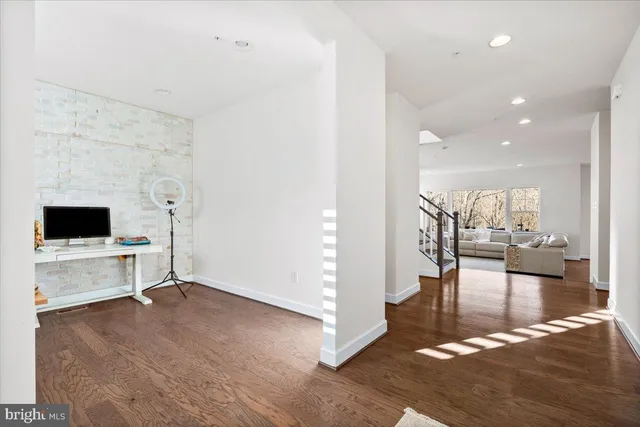 a view of living room filled with furniture and view of living room