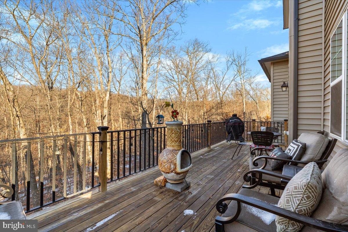 6828 West Shavano Road New Market, MD 21774 - Photo 19 of 58 a view of a balcony with chairs