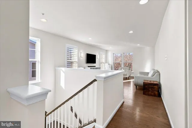 a view of living room kitchen with a flat screen tv