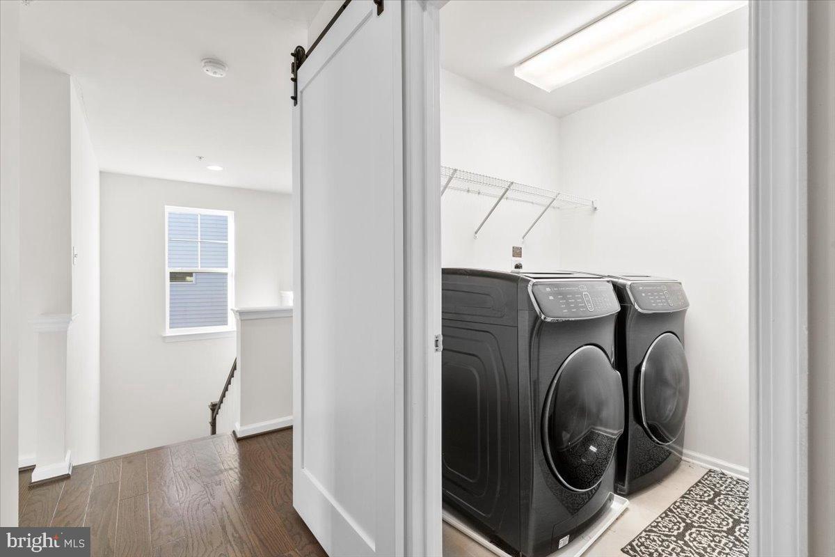 6828 West Shavano Road New Market, MD 21774 - Photo 24 of 58 a utility room with dryer and washer