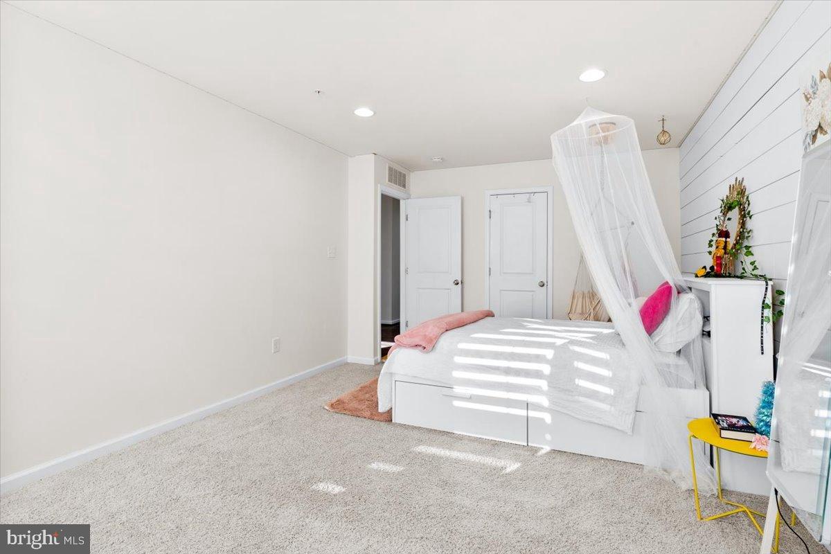 6828 West Shavano Road New Market, MD 21774 - Photo 38 of 58 a bedroom with a bed and a window