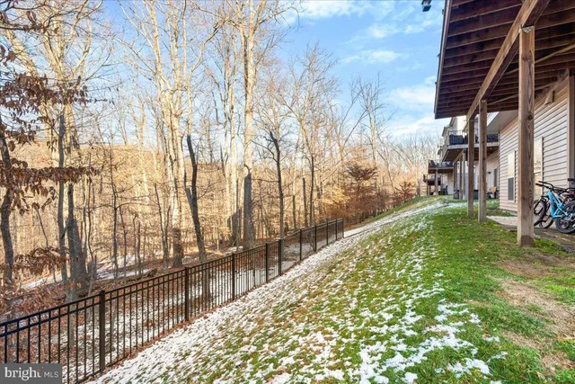 a view of swimming pool from a balcony