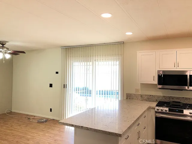 a bathroom with a sink toilet and mirror