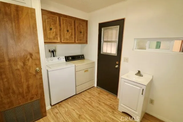 a bathroom with a sink toilet and mirror