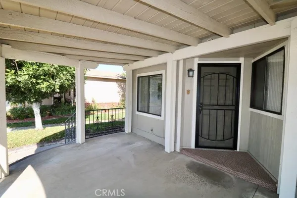 a view of a porch with hardwood floor and a porch