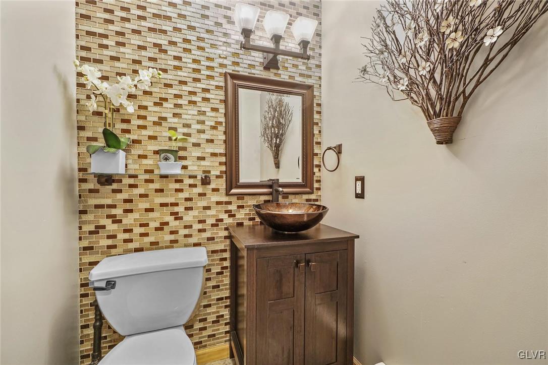 117 Mt Snow Road Henryville, PA 18332 - Photo 14 of 34 a bathroom with a toilet and a sink