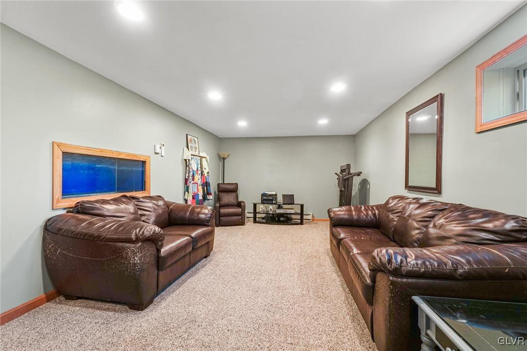 117 Mt Snow Road Henryville, PA 18332 - Photo 27 of 34 a living room with furniture
