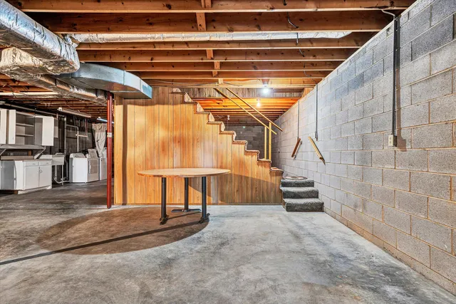 a view of a yard with large trees