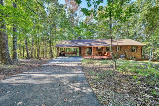 a backyard of a house with lots of green space