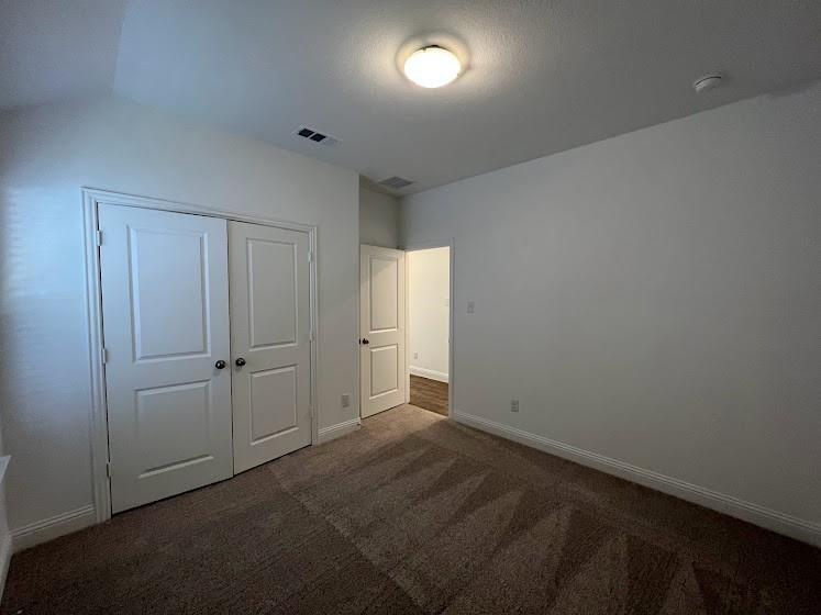 1408 Rendyn Street Anna, TX 75409 - Photo 12 of 23 Neutral-toned carpeting, white walls, and white trim