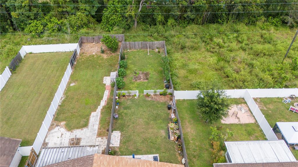 22751 Penny Loop Land O' Lakes, FL 34639 - Photo 23 of 27 an aerial view of residential houses with outdoor space