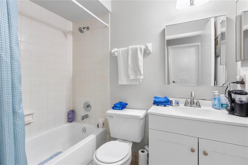 22751 Penny Loop Land O' Lakes, FL 34639 - Photo 10 of 27 a bathroom with a sink toilet and shower