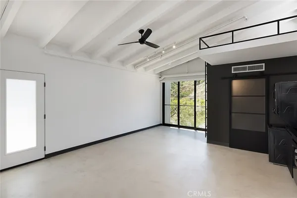 a view of a kitchen with furniture and a kitchen