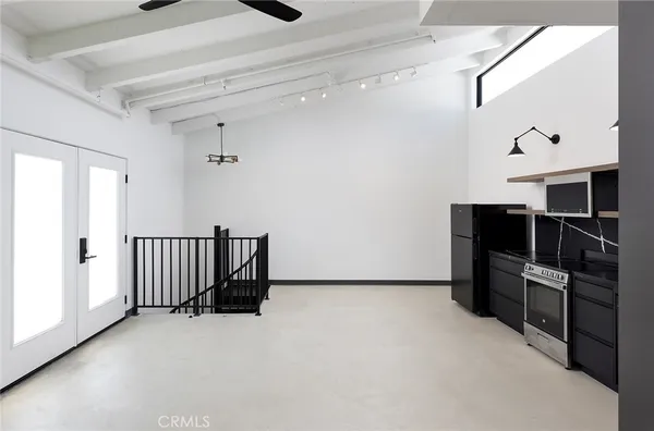 a view of gallery with stairs