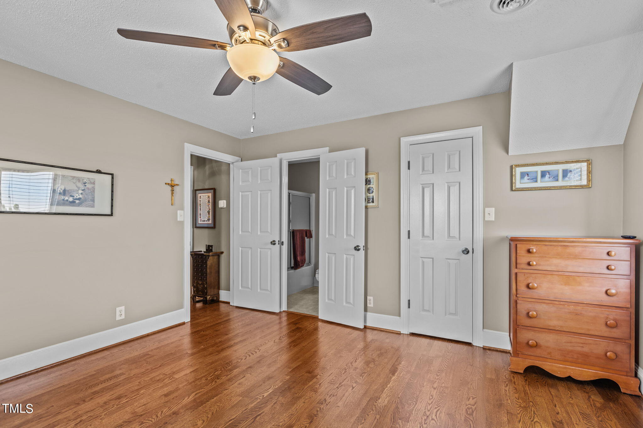 7980 Meadowbrook Road Benson, NC 27504 - Photo 39 of 56 a view of an empty room and wooden floor