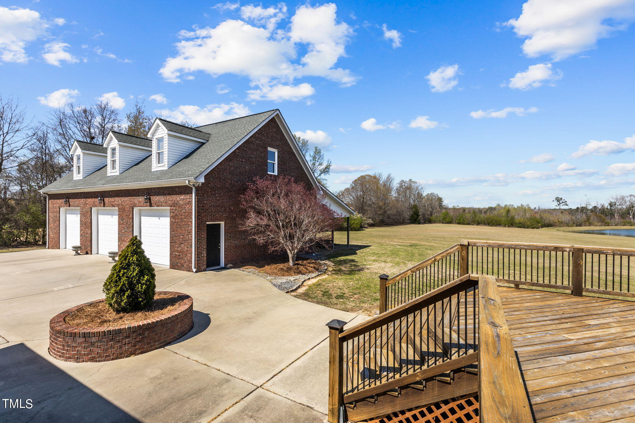 7980 Meadowbrook Road Benson, NC 27504 - Photo 55 of 56 a view of a house with backyard and sitting area