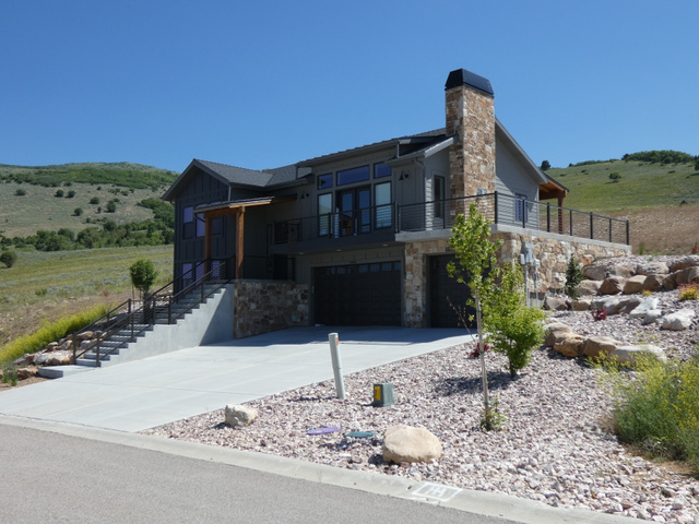 4500 North Seven Bridges Road, Unit 18 Eden, UT 84310 - Photo 10 of 15 Neighboring property and potential house style for this lot.